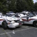 Polizeiautos niedergewalzt
