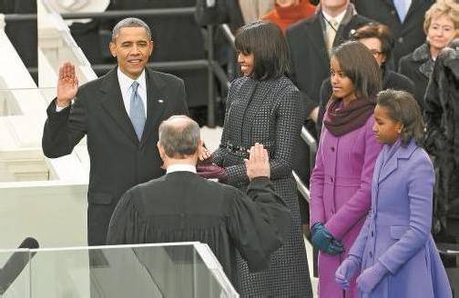 Barack Obama legte gestern im Beisein seiner Frau Michelle und seiner Töchter seinen Amtseid ab. Hunderttausende verfolgten das Ereignis. Foto: REUTERS