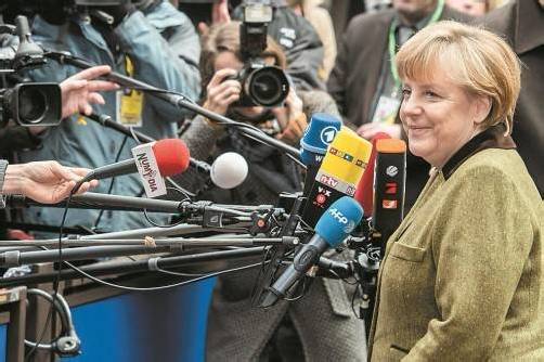 Deutschlands Bundeskanzlerin Angela Merkel auf dem Weg zum Budgetpoker in Brüssel. Foto: DAPD