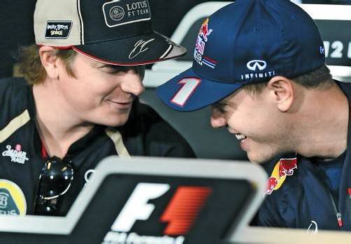 Formel-1-Schelme unter sich: Kimi Räikkönen und Sebastian Vettel. Foto: ap