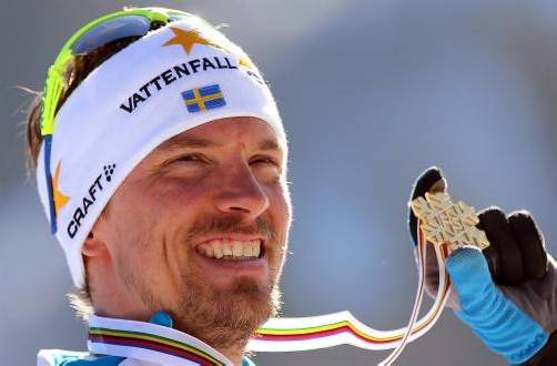 Strahlende Gesichter zum Abschluss der Nordischen Ski-WM im Val di Fiemme: Die Langlauf-Goldmedaillengewinner Johan Olsson und Marit Björgen. Foto: epa/ap