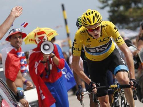 Angetrieben von den Fans verteidigte Christopher Froome das Gelbe Trikot. Foto: epa
