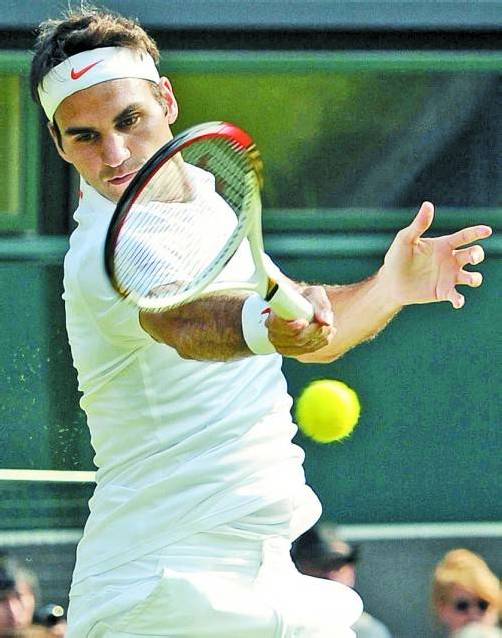 Federer verspricht sich vom Schlägerwechsel mehr Power. Foto: epa