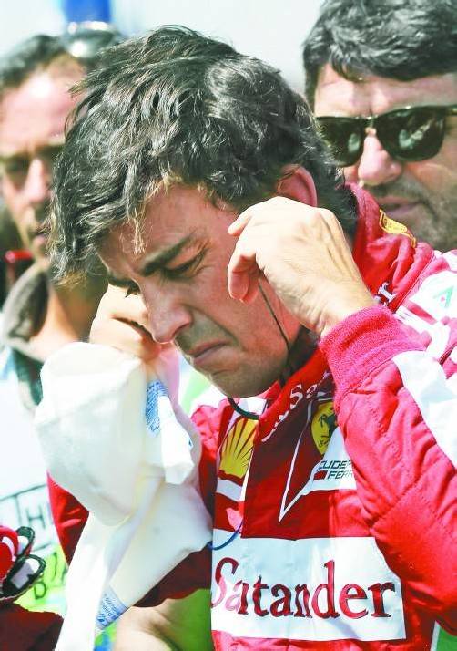 Fernando Alonso war nach dem Ungarn-Grand-Prix nicht gut aufgelegt – nach Platz fünf beklagte er sich über seinen Ferrari-Boliden. Foto: ap