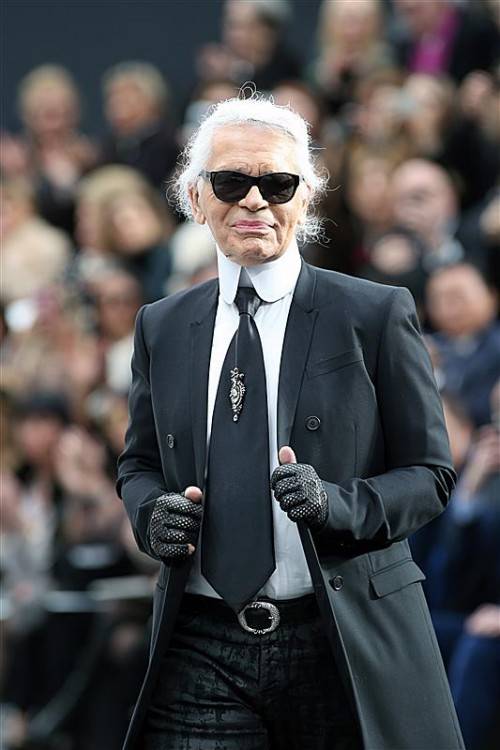 Lagerfeld würde Angela Merkel gerne modisch beraten. Foto: ap