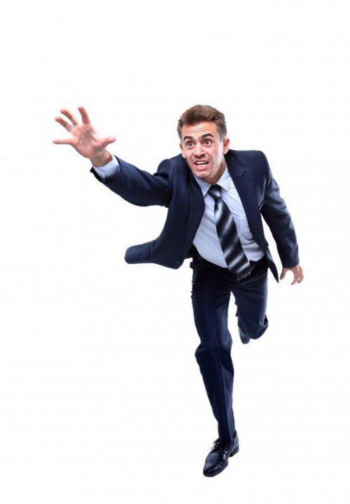 Happy running businessman. Isolated on white background.