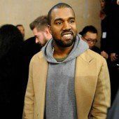 Kanye West zahlt für Prügelei