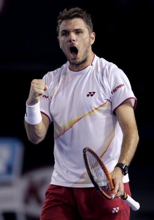 „Stan the Man“ wie Stanislas Wawrinka in der Schweiz seit dem Sieg über Djokovic gerufen wird, mit der Siegerfaust. Foto: ap