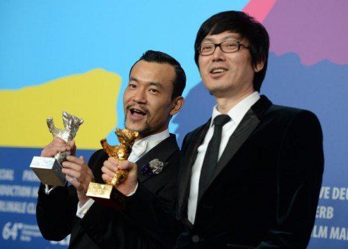Regisseur Yinan Diao (r.) und Schauspieler Fan Liao waren die Gewinner der 64. Berlinale. Foto: EPA