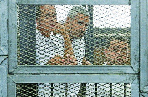 Angeklagte Peter Greste, Mohammed Fahmi und Baher Mohamed (v.l.): Auch Amnesty International kritisierte den Prozess. Foto: AP