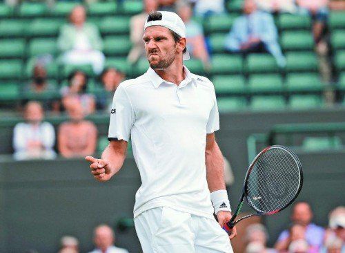 Jürgen Melzer fordert Jo-Wilfried Tsonga voll. Foto: apa