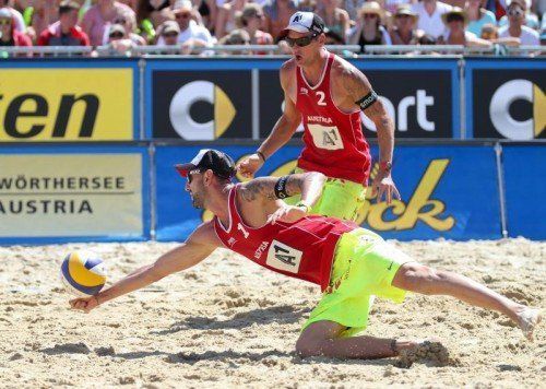 KLAGENFURT,AUSTRIA,01.AUG.14 - BEACH VOLLEYBALL - FIVB World Tour 2014, Grand Slam Klagenfurt. Image shows Clemens Doppler and Alexander Horst (AUT).
Photo: GEPA pictures/ Christian Walgram