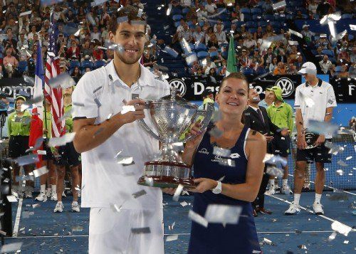 Die Mixed-Team-Weltmeister Janowicz und Radwanska. Foto: ap