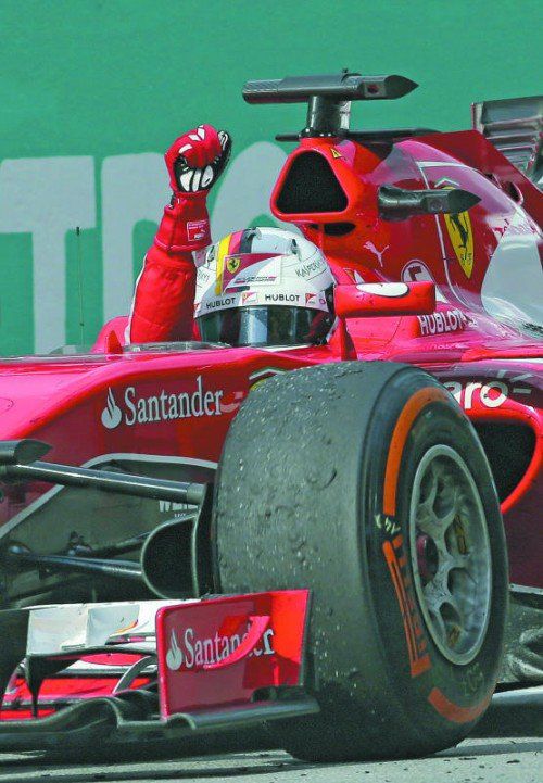 Der erste Triumph im roten Renner: Sebastian Vettel. Foto: ap
