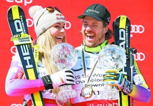 Glücklich mit Abfahrts-Kristall: Lindsey Vonn und Kjetil Jansrud sicherten sich mit Siegen beim Saisonfinale in Meribel die Disziplinkugeln. Foto: gepa