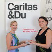 Smartphone-Spende für die Caritas