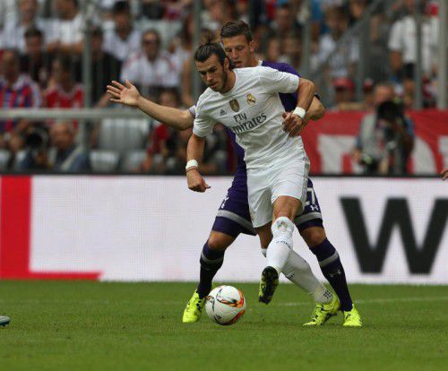 Kevin Wimmer (im Zweikampf mit Madrids Gareth Bale) spielte bereits beim Audi-Cup in München für seinen neuen Klub Tottenham.