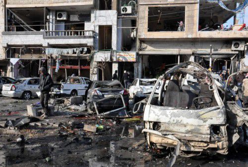 Dutzende Menschen kamen bei den Explosionen an einem Kontrollpunkt in Homs ums Leben.
