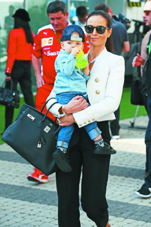 Kimi Räikkönens Freundin Minttu und Sohn Robin.