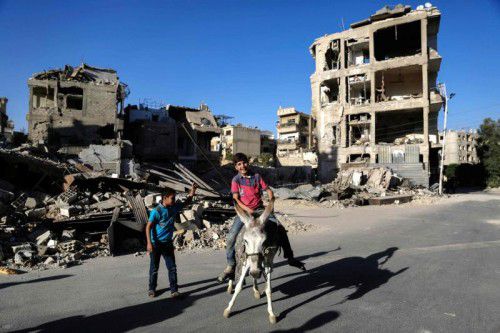 Keine Bomben: In Aleppo spielen Kinder wieder im Freien.  afp