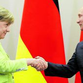 Merkel und Putin halten an Friedensprozess für die Ukraine fest