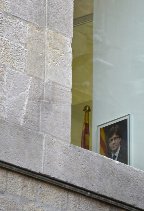 Im Gebäude der katalanischen Regierung hängt noch ein Bild von Puigdemont. Er selbst hat sich nach Belgien abgesetzt.  afp