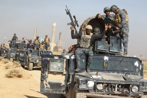 Irakische Truppen nähern sich einem Ölfeld. Peschmerga-Kämpfer sprachen von einer Kriegserklärung. reuters