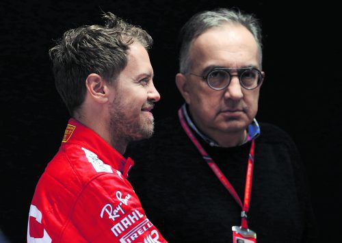 Ferrari-CEO Sergio Marchionne und sein Vorfahrer Sebastian Vettel. ap