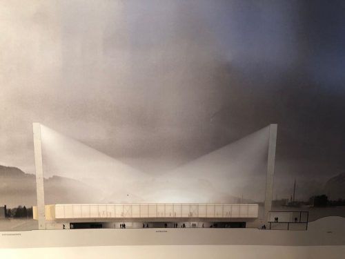 Die Sicht vom Rheinvorland aus, wobei die Lichtmasten das Gesamtbild des neuen Planet-Pure-Stadions prägen. Oben ein Querschnitt der Tribüne des Siegerprojekts, das klar den Betonsockel und die darüber liegende Tribünen in Holzbauweise zeigt. VN
