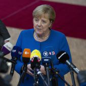 Merkel und Macron loben neuen Deal