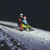 Mit dem Rodel zurück ins Tal
