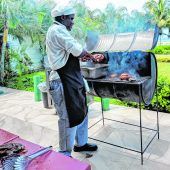 Jerk Chicken und frische Mangos