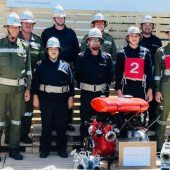 Eine siegreiche Feuerwehrtruppe
