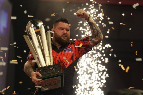 Michael Smith jubelt nach seinem erstmaligen Sieg bei der Darts-WM. afp