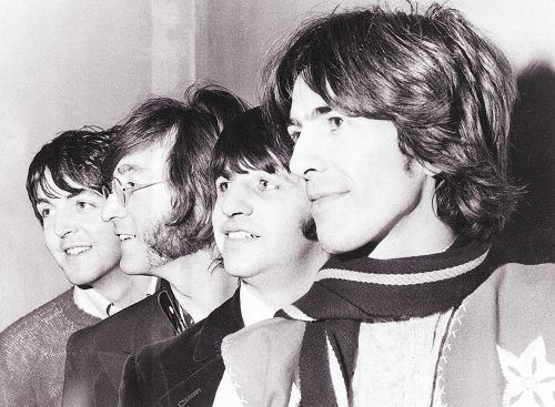 George Harrison (r.) galt als der stille Beatle. AP Photo, File