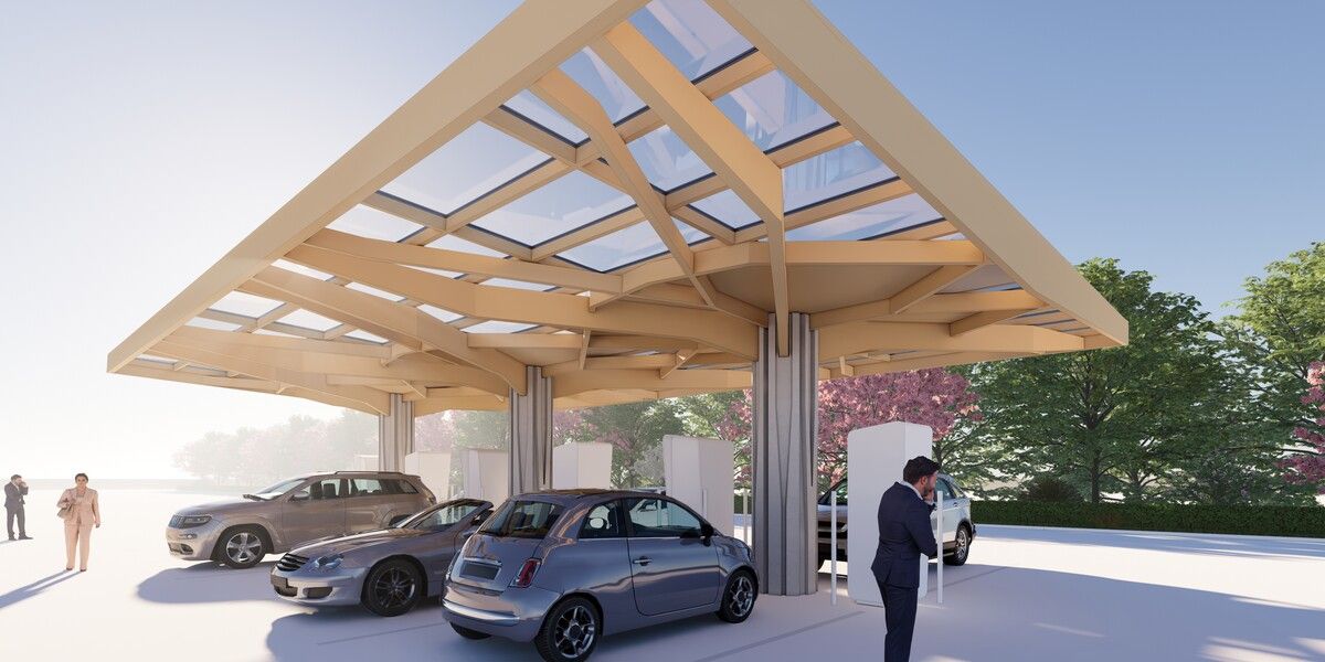 „Zero CO2 Ladepark Bregenz“: Eine schwebende Dachkonstruktion aus Holz und transparenten Photovoltaik-Modulen mit Säulen aus Basaltbeton. Fa