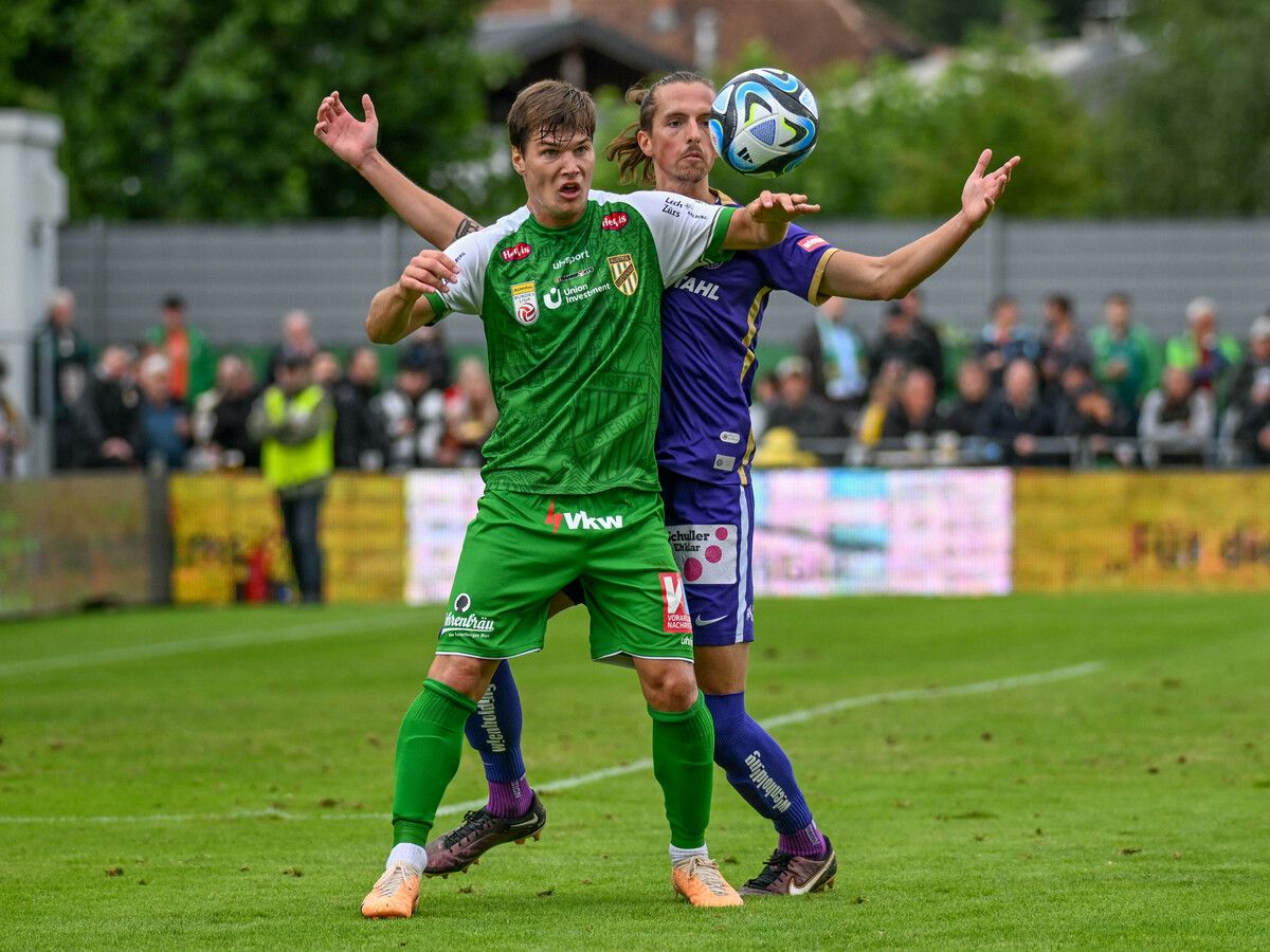 LUSTENAU,AUSTRIA,06.AUG.23 - SOCCER - ADMIRAL Bundesliga, SC Austria Lustenau vs FK Austria Wien. Image shows Stefano Surdanovic (A.Lustenau) and Johannes Handl (A.Wien). Photo: GEPA pictures/ Oliver Lerch