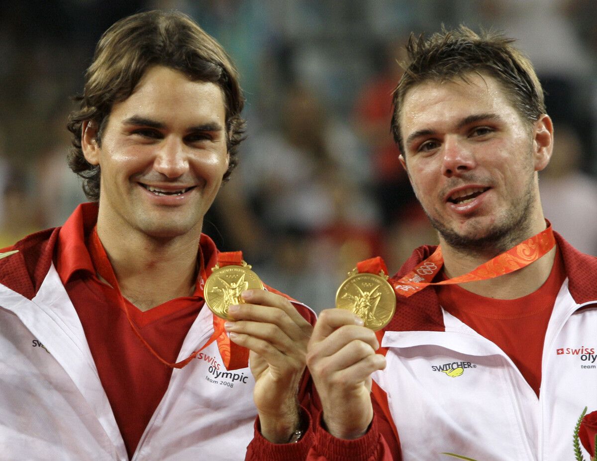 Roger Federer und Stan Wawrinka mit ihrer Olympia-Goldenen 2012 in London.AP