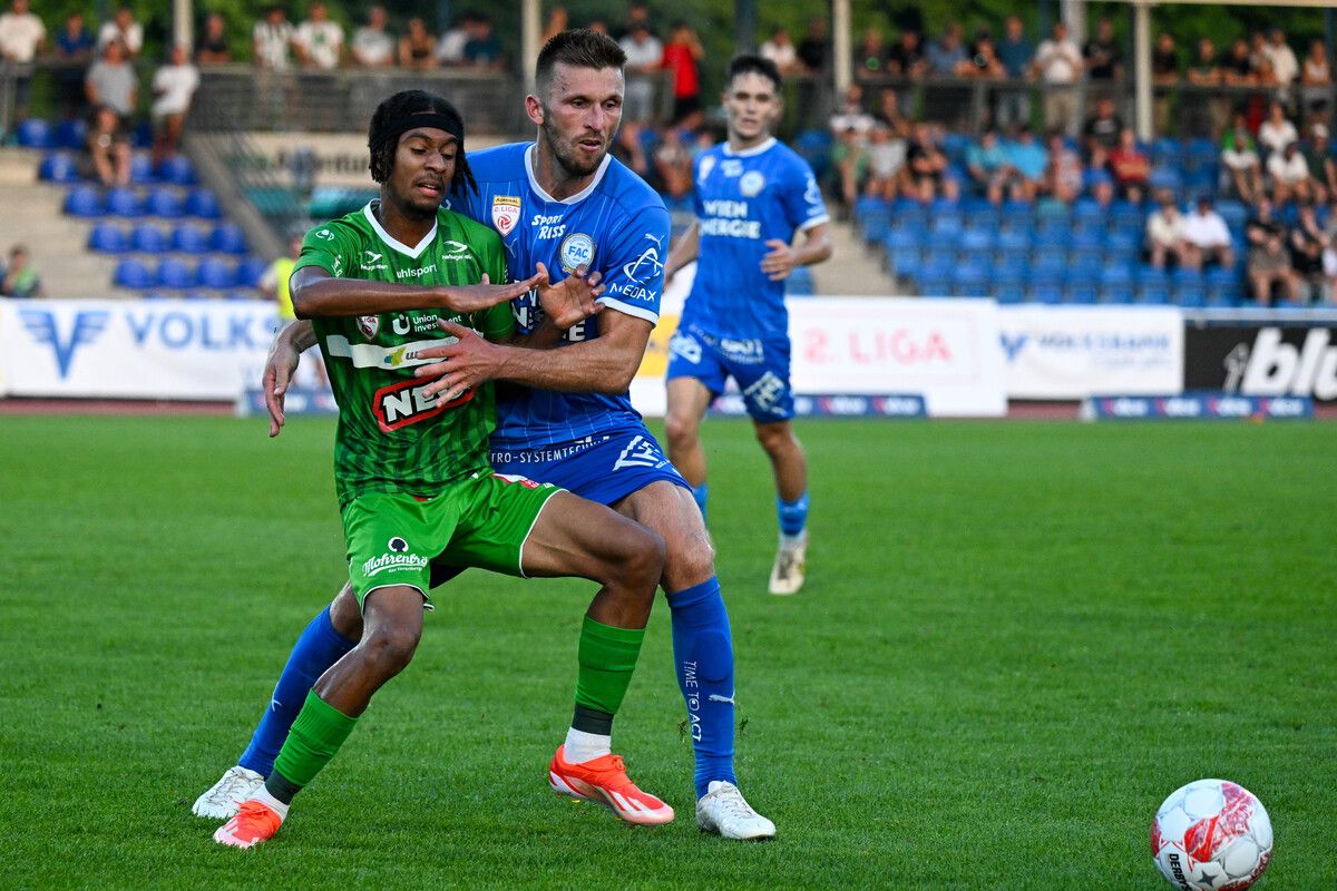 BREGENZ,AUSTRIA,30.AUG.24 - SOCCER - ADMIRAL 2. Liga, SC Austria Lustenau vs Floridsdorfer AC Wien. Image shows Abdellah Baalal (A.Lustenau) and Christian Bubalovic (FAC). Photo: GEPA pictures/ Oliver Lerch