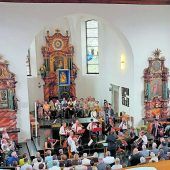 Ein Servus mit Pauken und Trompeten