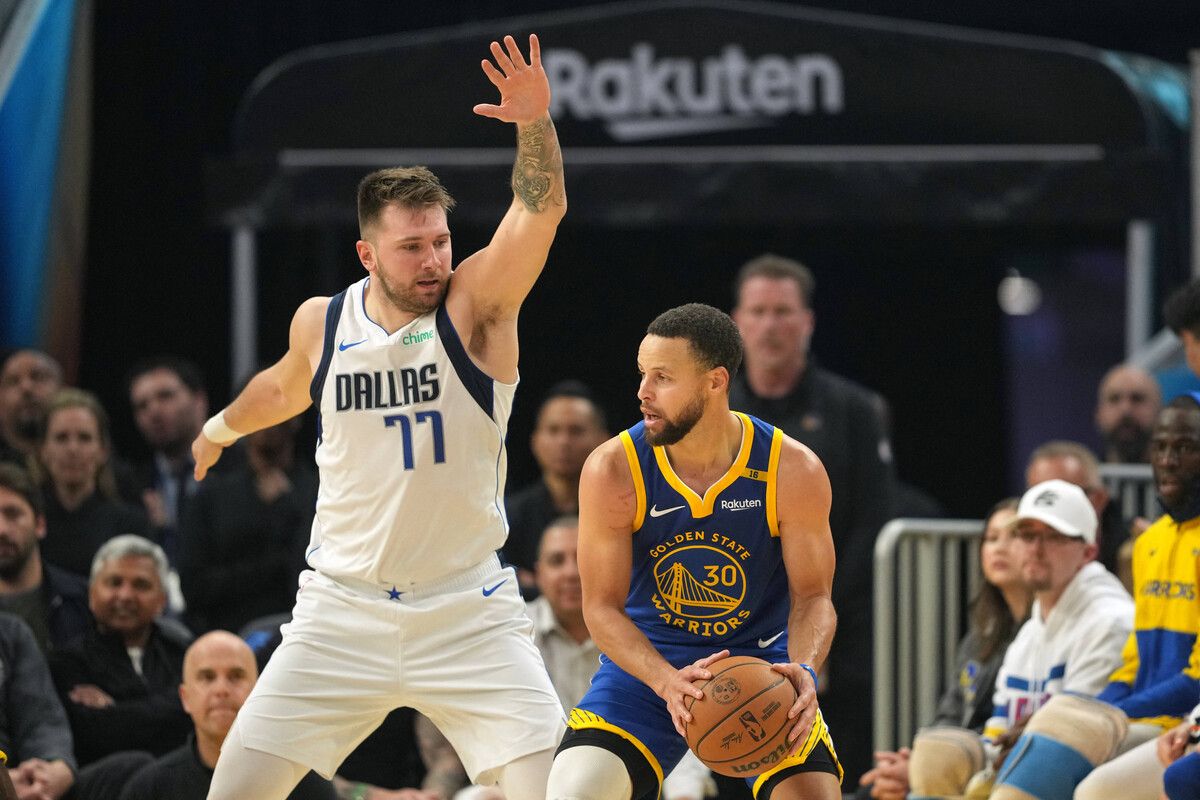 Mavericks-Star Luka Doncic im Duell mit Stephen Curry.⇒AP