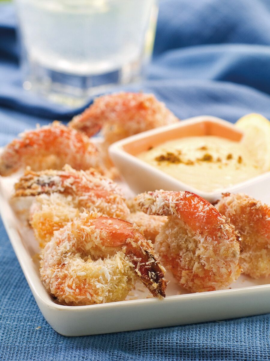Ein Klassiker: Knusprige Coconut Shrimps mit Mango-Dip.⇒Shutterstock
