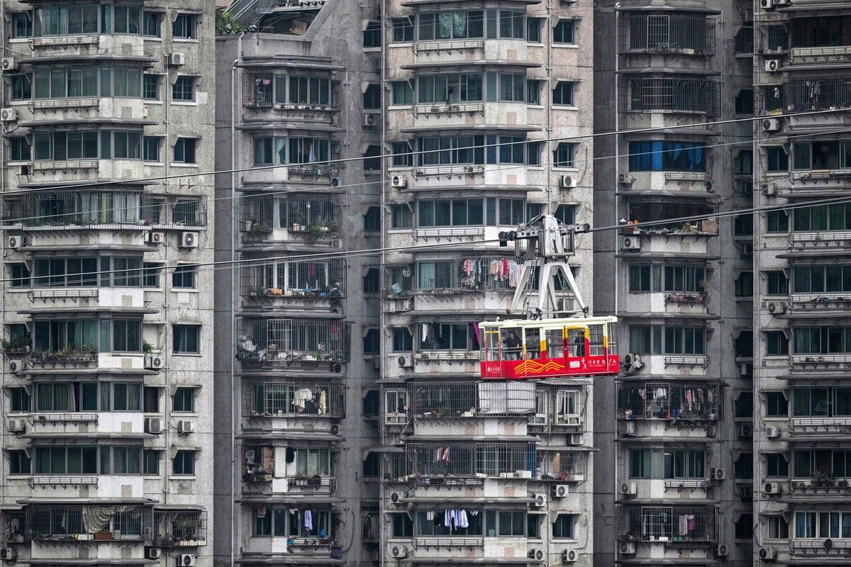Die Yangtze River Cableway führt in Chongqing im Südwesten Chinas an Wohntürmen vorbei. AFP