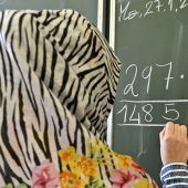 Kopftuchverbot für Unter 14-Jährige und einige Fragezeichen