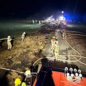 Misthaufen in Flammen