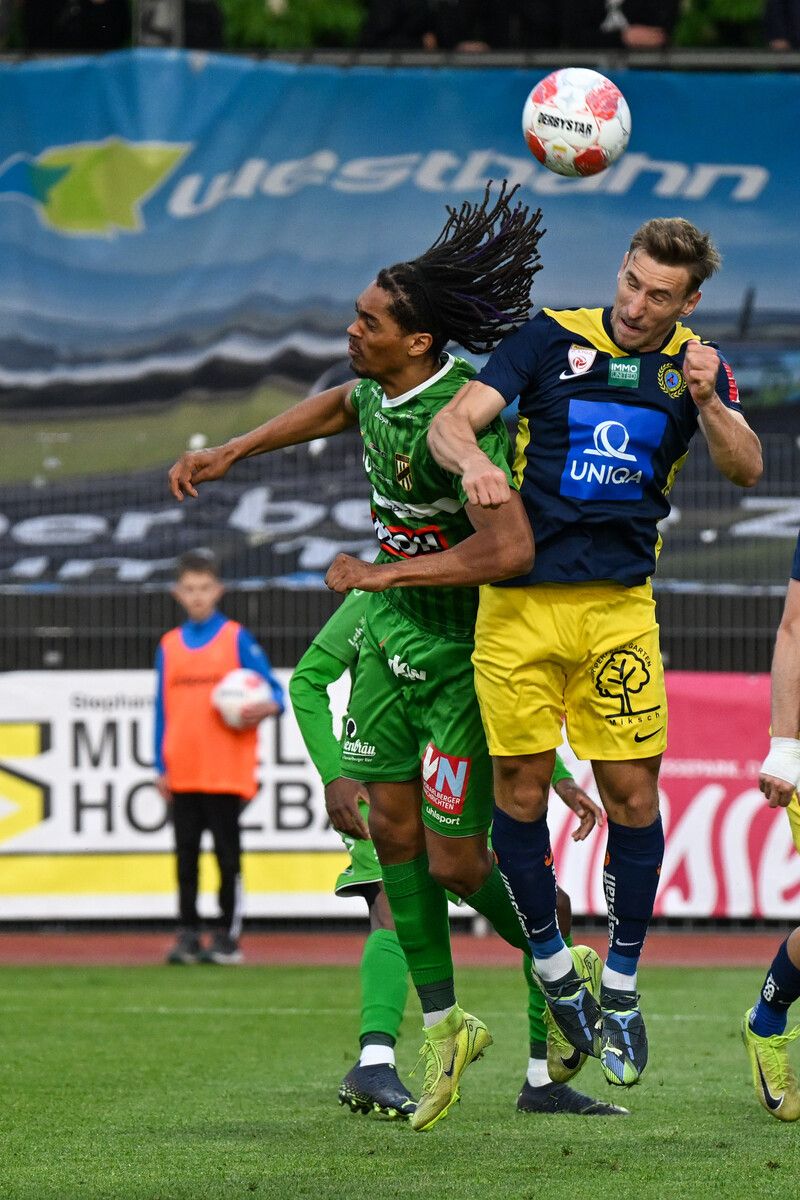 BREGENZ,AUSTRIA,09.MAY.25 - SOCCER - ADMIRAL 2. Liga, SC Austria Lustenau vs First Vienna FC 1894. Image shows Namory Cisse (A.Lustenau) and Juergen Bauer (Vienna). Photo: GEPA pictures/ Oliver Lerch