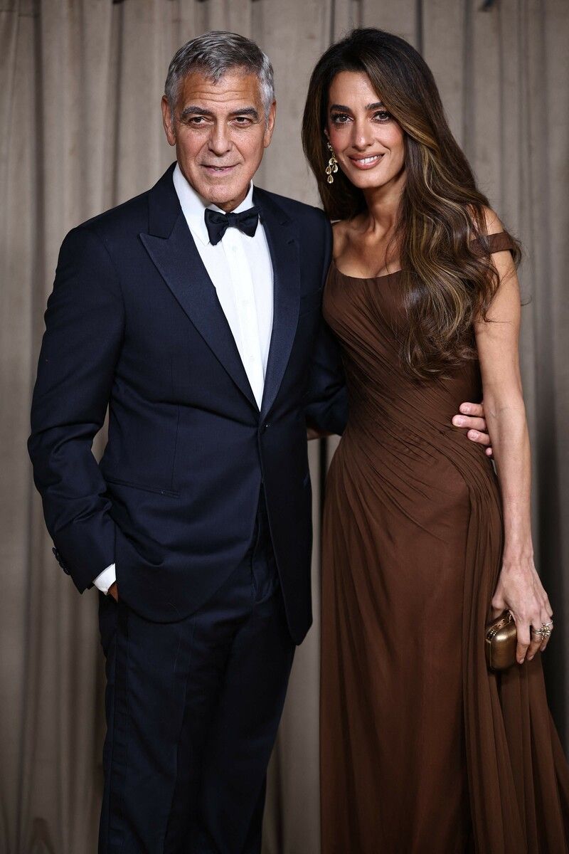 George Clooney mit seiner Ehefrau Amal.⇒afp