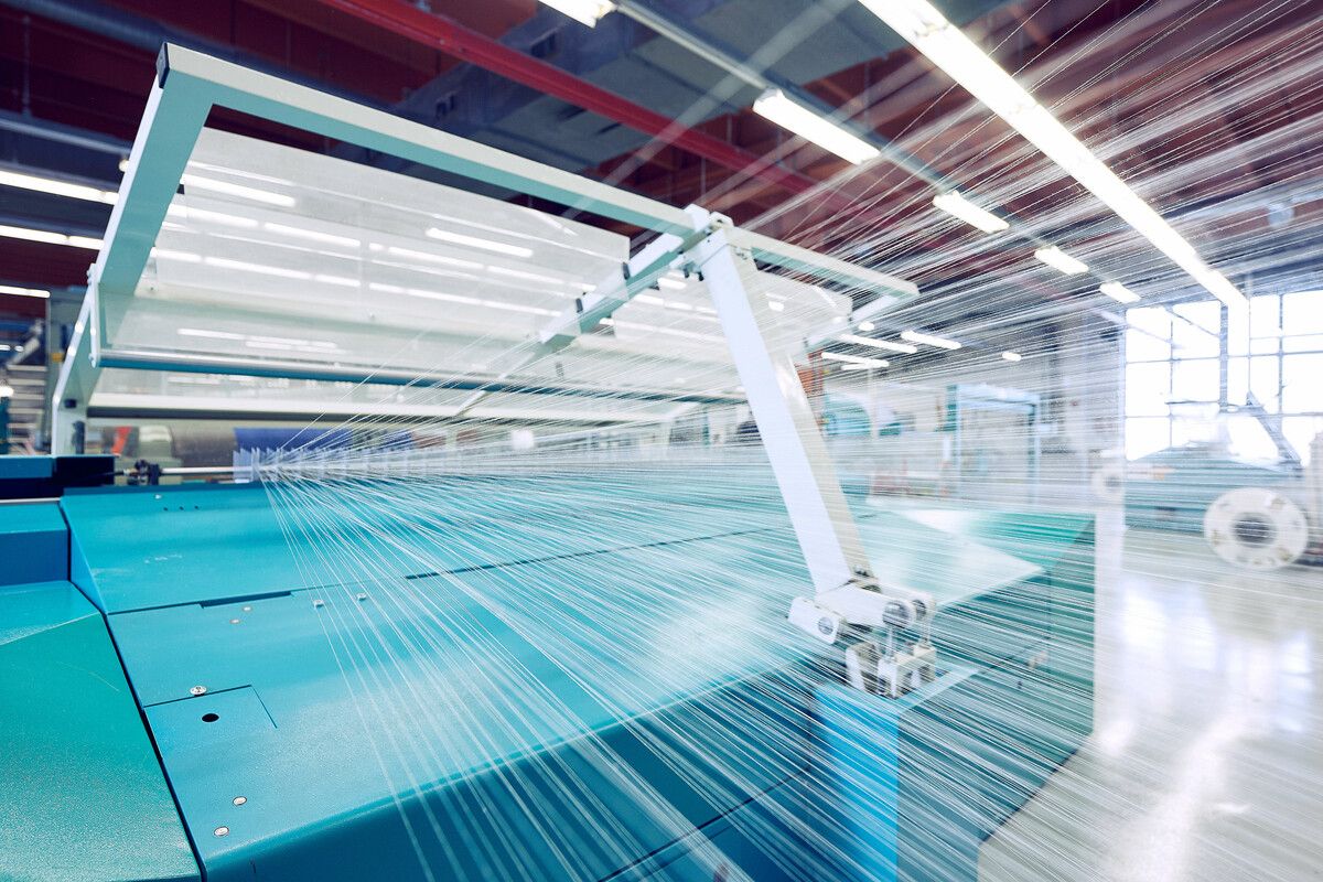 Technologische Entwicklung und Klimaschutz gehen bei Getzner Textil Hand in Hand. Dafür werden u.a. ressourceneffiziente Maschinen eingesetzt.⇒Fa/Hagen
