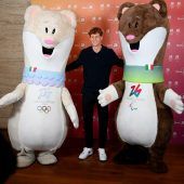 Medaillen und Maskottchen